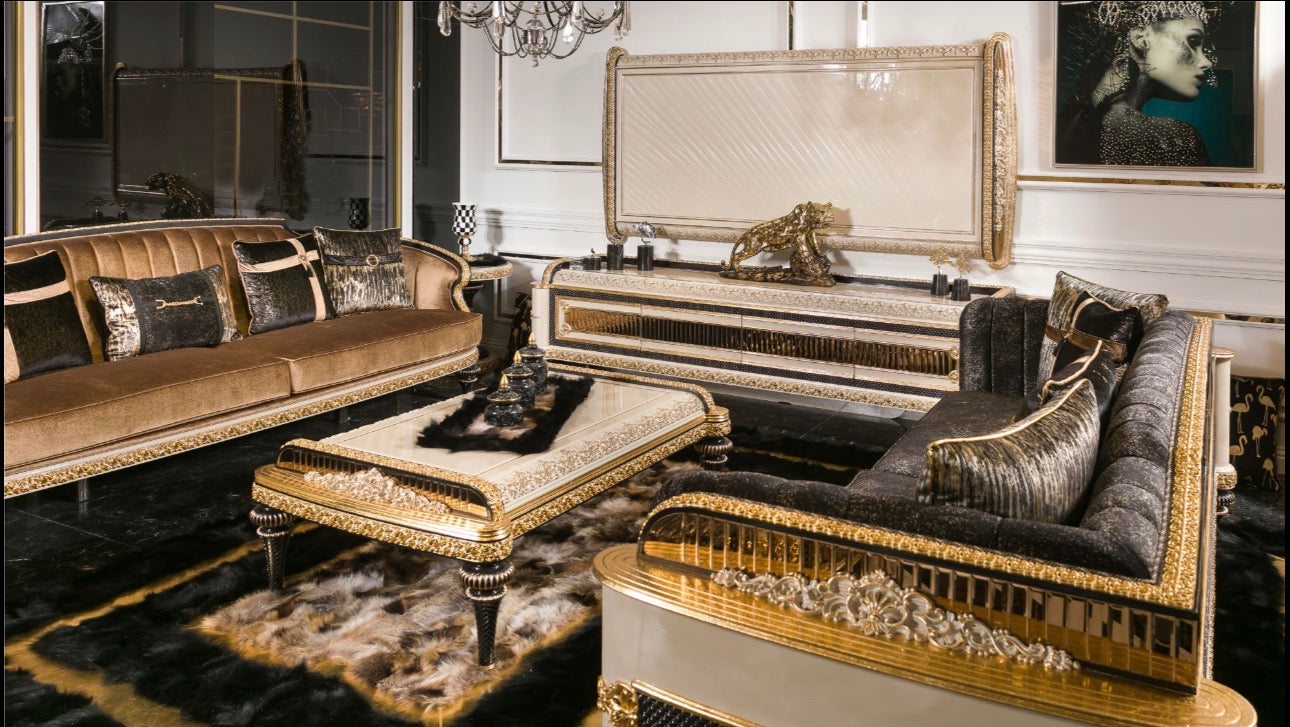 Regalia luxury furniture collection featuring ornate gold living room seating and classic dining set with intricate detailing and black marble flooring.