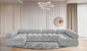 Fancci Stonecrest Atelier deep tufted modular sectional sofa with oversized design in a modern luxury living space.
