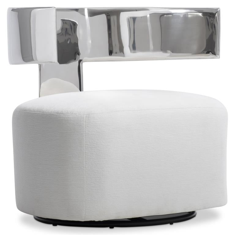 Orvane chairs with curved polished metal backs and textured upholstered bases in a modern luxury setting.