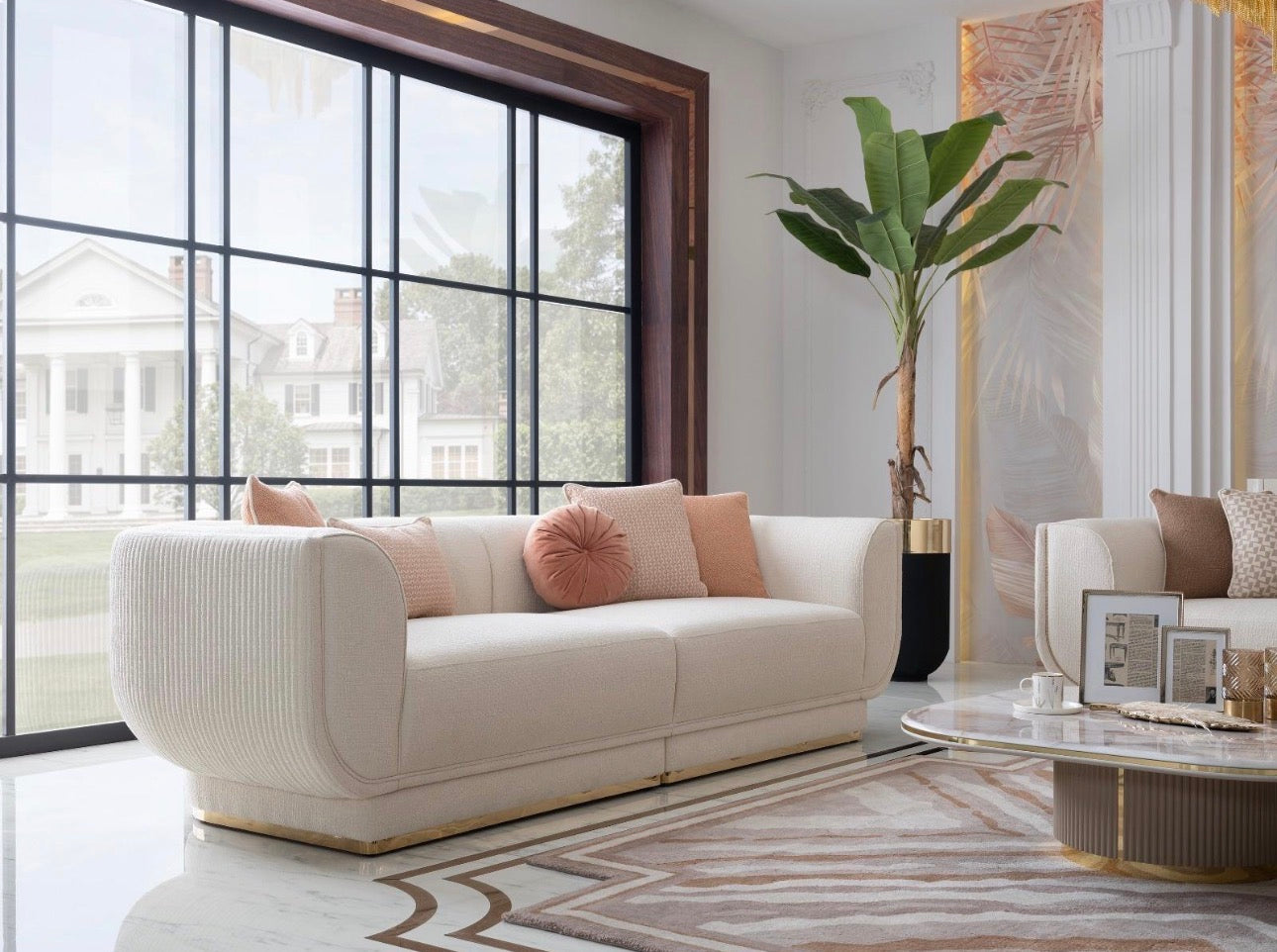 Fancci Valorex luxury living room and dining collection with curved sofas, gold accents, and soft neutral tones in a modern interior.