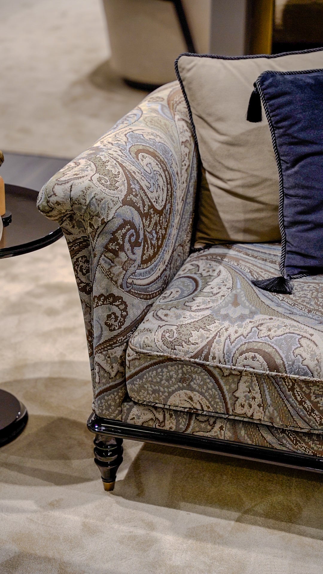 Relic luxury furniture collection featuring black lacquer display cabinets, gold accents, and classic modern living room design